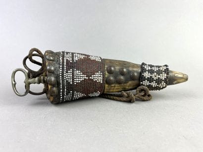Mohara talisman horn, partially covered with...