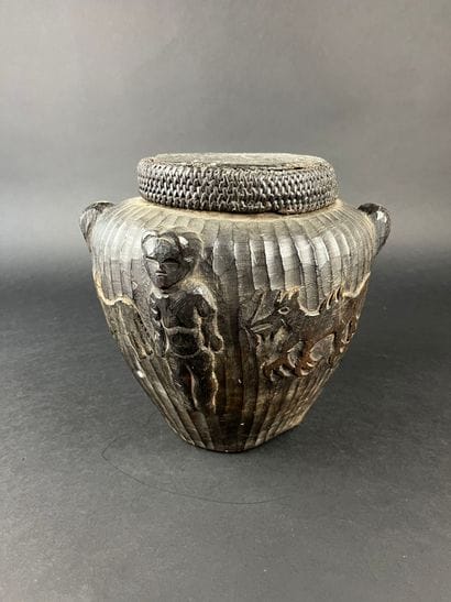 Pot with its lid. It is decorated with three...