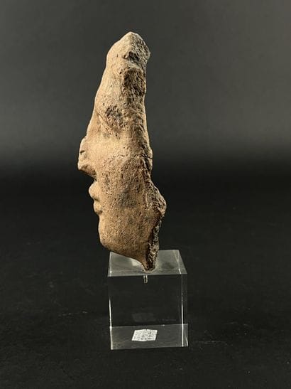 Fragmentary anthropomorphic votive head....