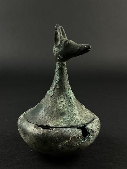 Vase with a zoomorphic head on the lid. Bronze....