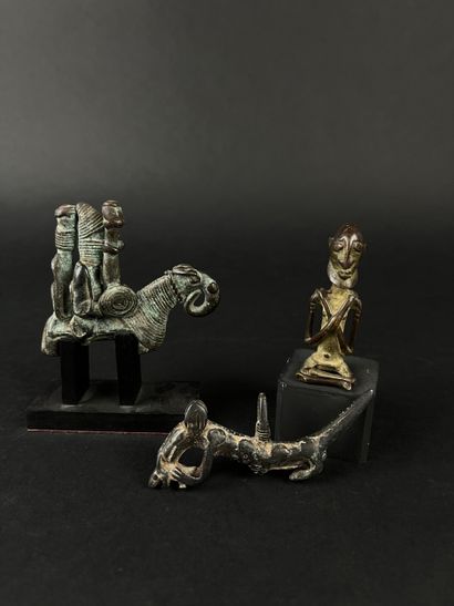 Set of four bronze figurines: A rider, size:...