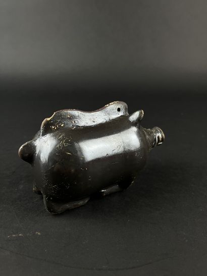 Plastic vase in the shape of a boar. Black...