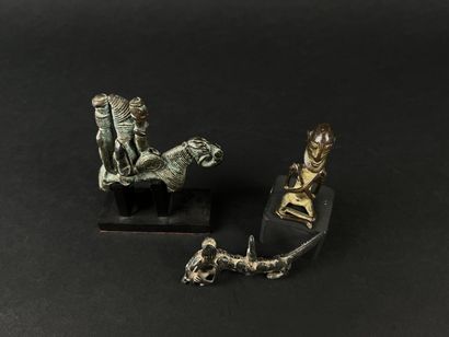 Set of four bronze figurines: A rider, size:...