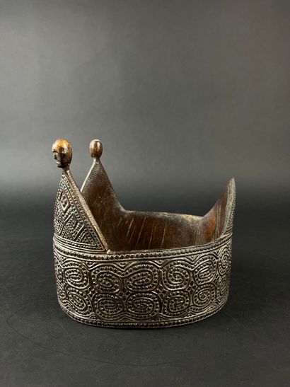 Crown adorned with geometric motifs, the...