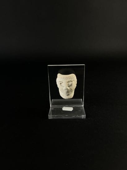 Small anthropomorphic mask, eyes painted...