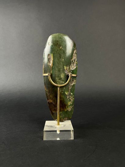 Polished green stone axe blade, (visible...