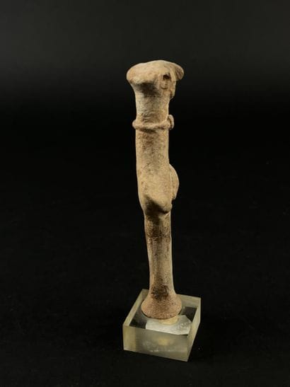 Anthropomorphic idol wearing a necklace....