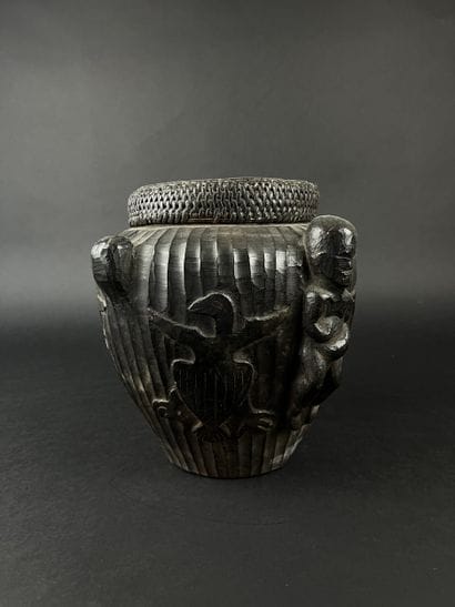 Pot with its lid. It is decorated with three...