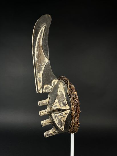 mma ji face mask (yam knife). It is adorned...