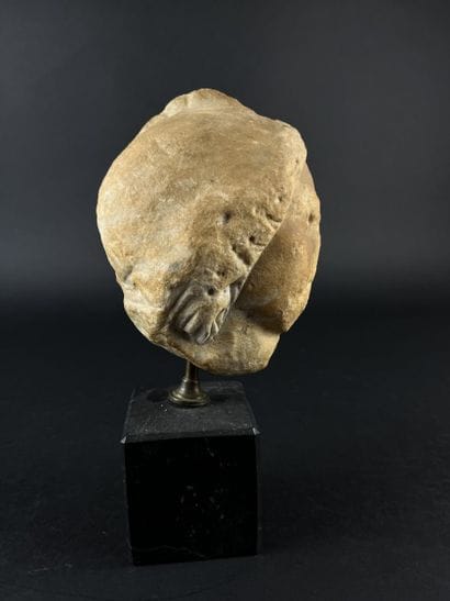 Head representing the helmeted goddess Minerva....