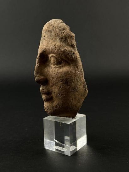 Fragmentary anthropomorphic votive head....