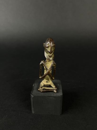 Set of four bronze figurines: A rider, size:...
