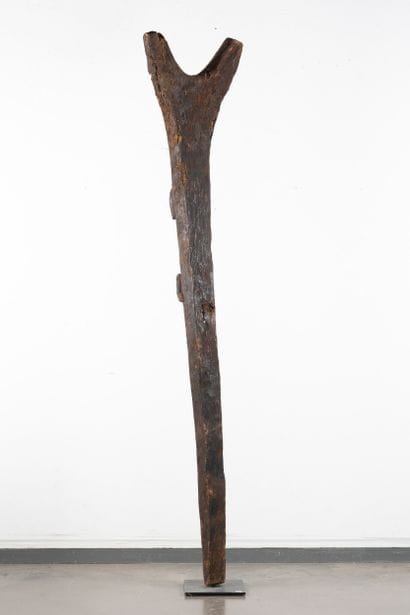 Toguna. Pillar carved in high relief with...