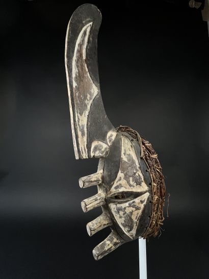 mma ji face mask (yam knife). It is adorned...