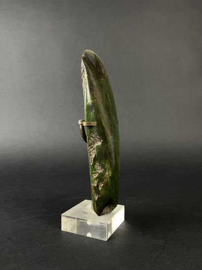 Polished green stone axe blade, (visible...