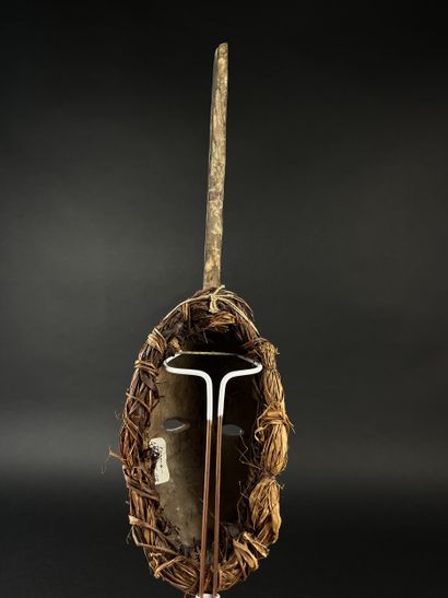 mma ji face mask (yam knife). It is adorned...