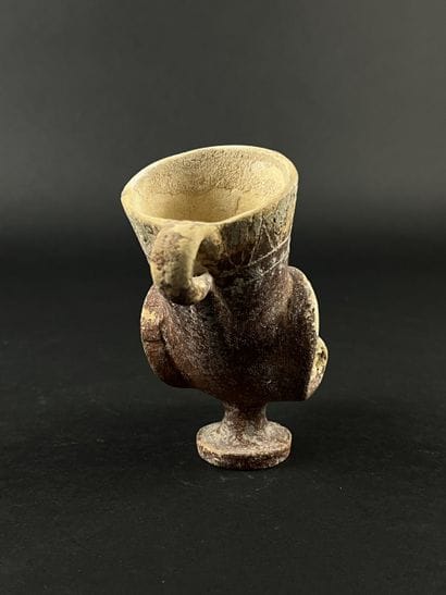 Lot consisting of a zoomorphic askos, a ram-head...