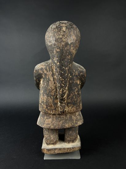 Lot of three objects: a statue of a figure...
