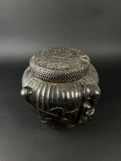 Pot with its lid. It is decorated with three...