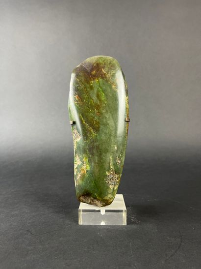 Polished green stone axe blade, (visible...