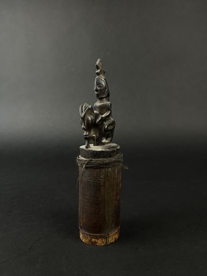 Bamboo box with wooden stopper representing...
