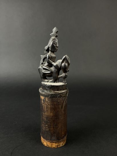 Bamboo box with wooden stopper representing...
