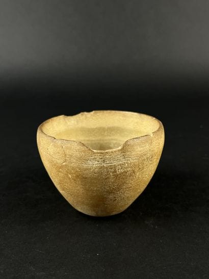 Hemispherical dish. Alabaster, visible chips....