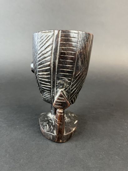 Palm wine goblet featuring an anthropomorphic...