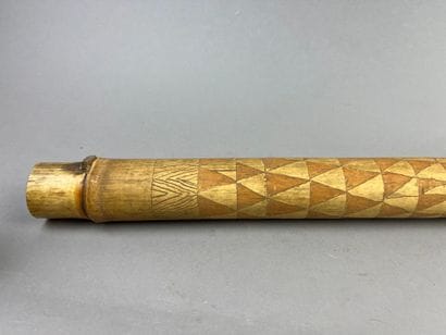 Two-hole bamboo flute decorated with geometric...