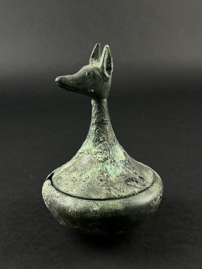 Vase with a zoomorphic head on the lid. Bronze....