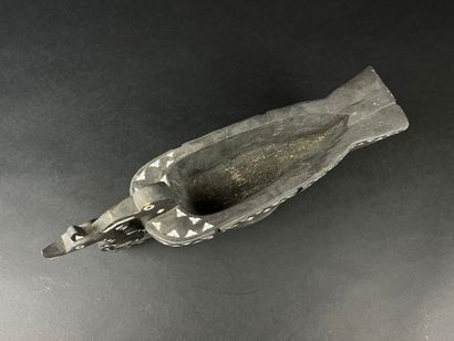 Blackened wood bowl representing a frigate...