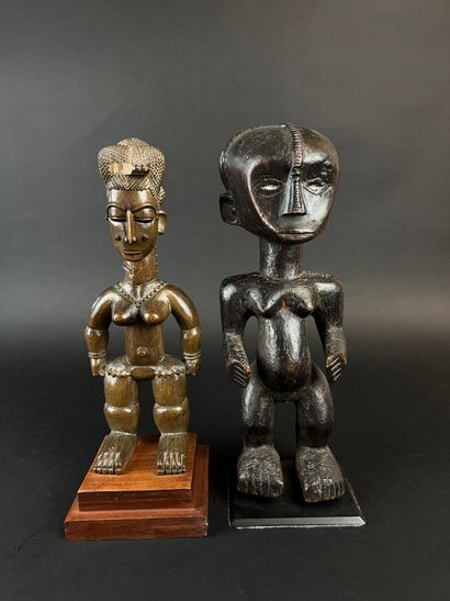 Two standing statuettes, one from Côte d'Ivoire,...