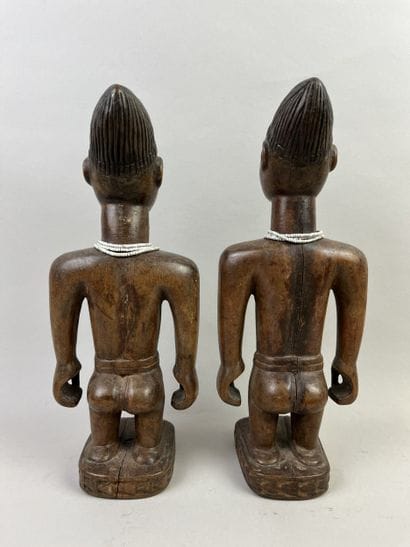 Pair of Ibedji. One male and one female,...