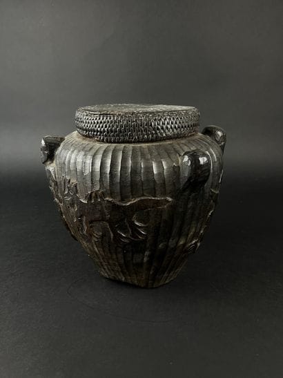 Pot with its lid. It is decorated with three...