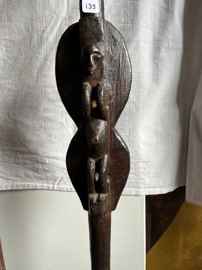 Two canes each representing a figure, one...
