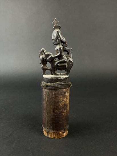 Bamboo box with wooden stopper representing...