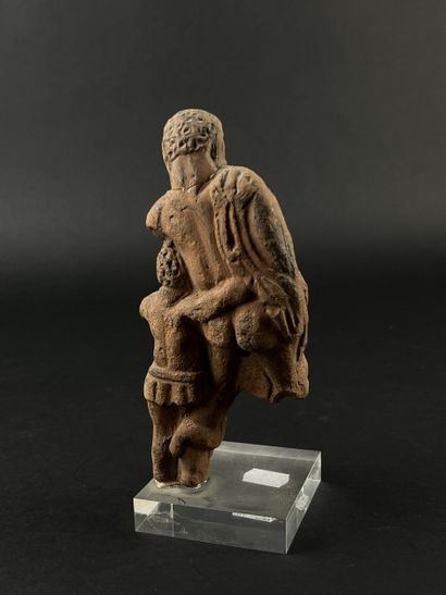 Statuette representing a bearded figure and...