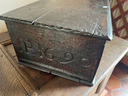 Small molded and carved oak chest with leafy...