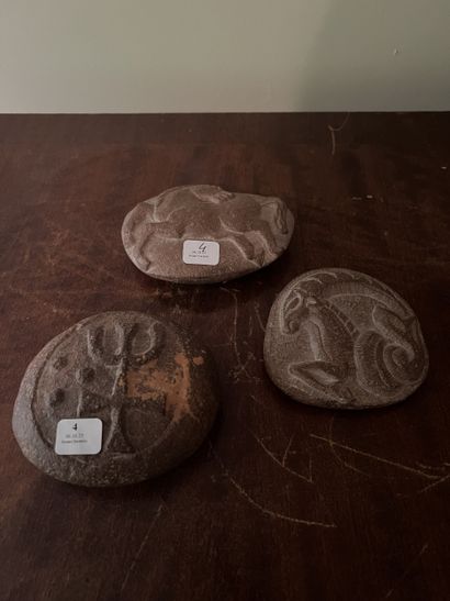 Set of three antique-inspired carved pebbles...