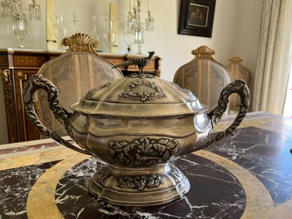 Large silver-plated tureen with curved rim...
