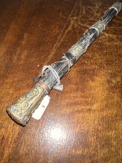 Iron spear point engraved with stylized motifs....