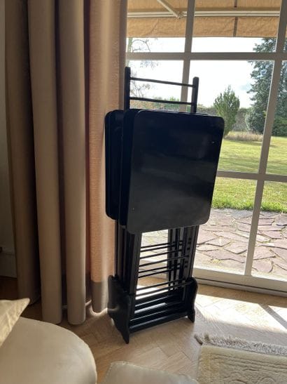 Set of four small folding tables and their...