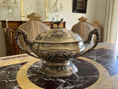 Large silver-plated tureen with curved rim...