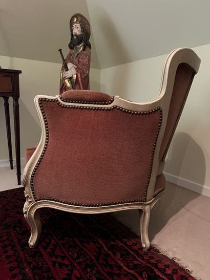 Pair of bergères in molded and carved wood...