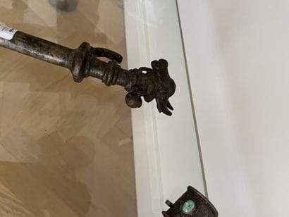 Bronze scepter. The handle is adorned with...