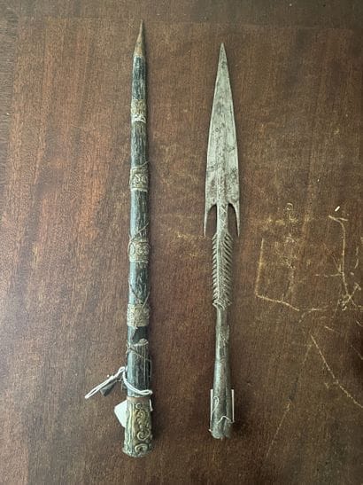 Iron spear point engraved with stylized motifs....