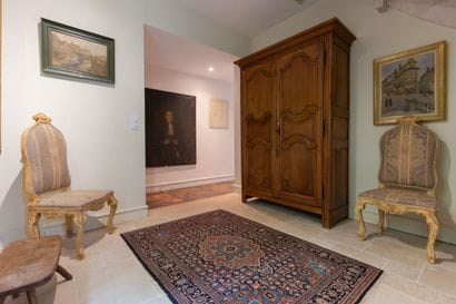 Walnut cabinet with oak side rails opening...