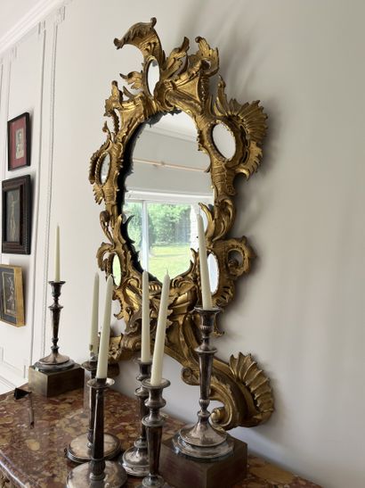Stunning gilded wood mirror carved with foliage...