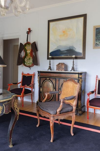 Suite of three caned armchairs in beech,...