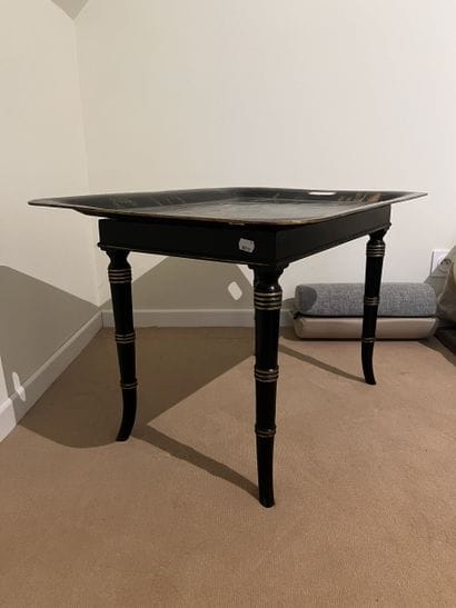 Tea table, black-lacquered metal top with...